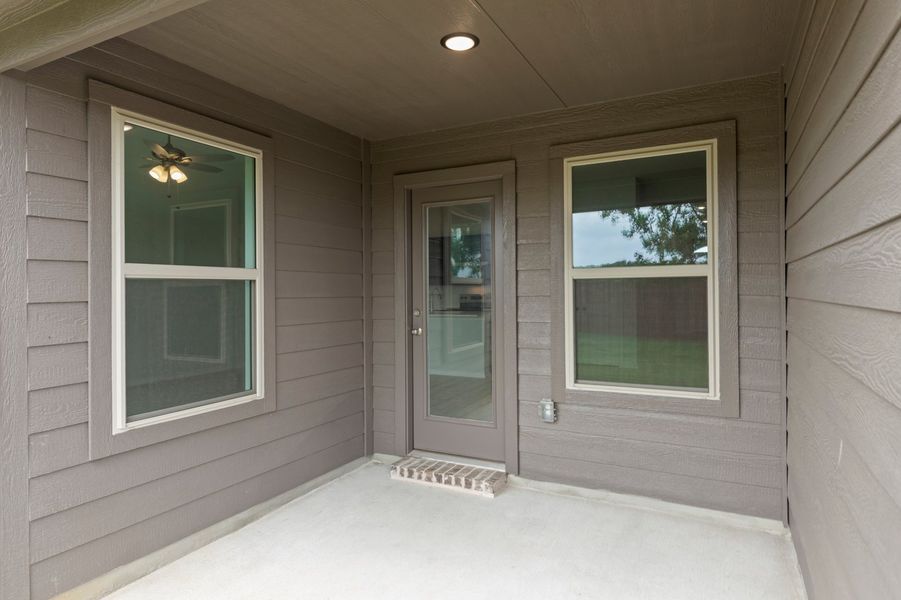 Front exterior of a new home in Belmont, Aubrey, TX, highlighting curb appeal (Image 28). Front exterior of a new home in Belmont, Aubrey, TX, highlighting curb appeal (Image 28).