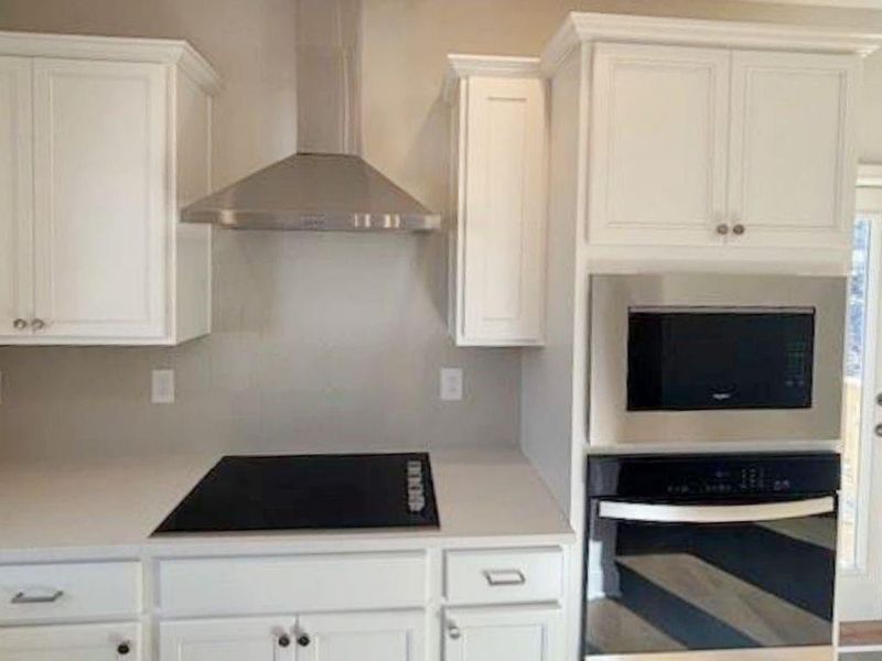 Furnished interior view inside a new home in , Buford (Image 5).