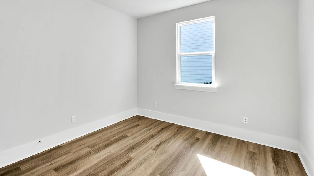 Spacious, unfurnished interior of a new home in The Haven at Indigo Preserve, Leland (Image 22).