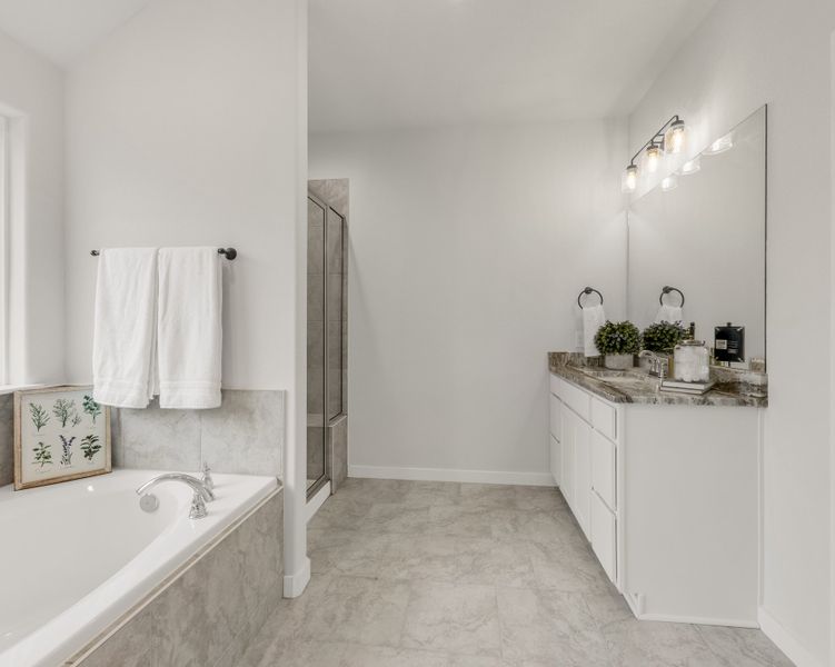 Representative furnished interior of a home built from the The Dahlia by Avonley Homes in Pinemont, Bryan (Image 14).