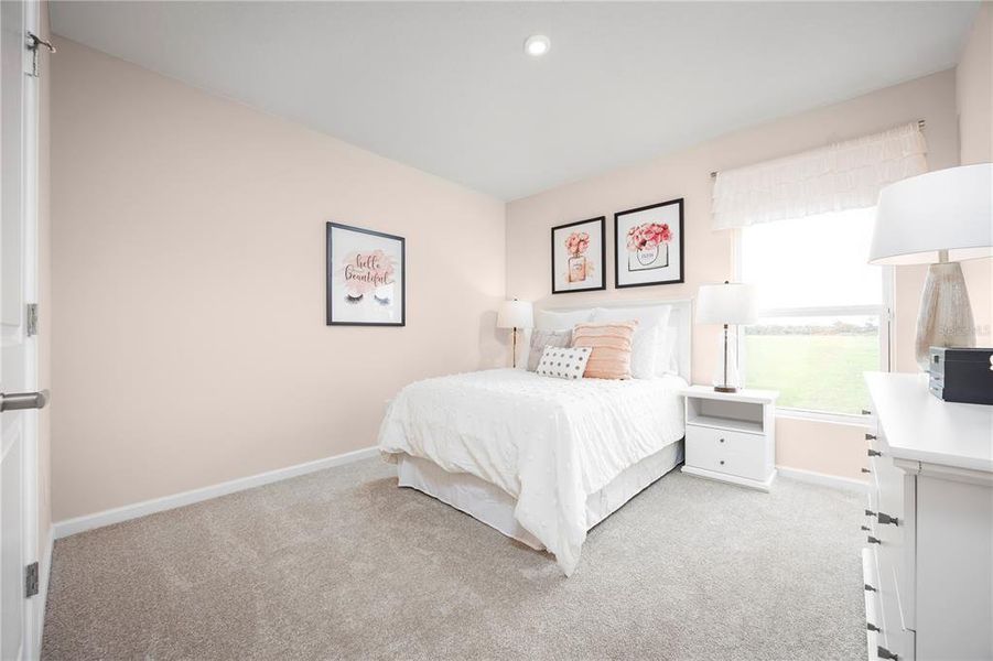 Furnished interior view inside a new home in Scenic Terrace, Haines City (Image 13).