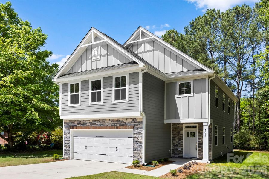 Front exterior of a new home in , Harrisburg, NC, highlighting curb appeal (Image 19). Front exterior of a new home in , Harrisburg, NC, highlighting curb appeal (Image 19).