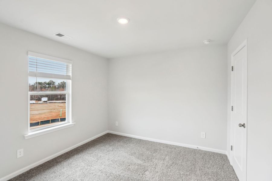 Spacious, unfurnished interior of a new home in Hemingway - Reserve Series, Cumming (Image 15). Spacious, unfurnished interior of a new home in Hemingway - Reserve Series, Cumming (Image 15).