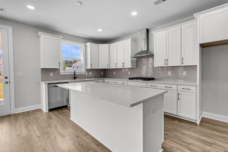 Furnished interior view inside a new home in Tidewater at Lakes of Cane Bay, Summerville (Image 13).
