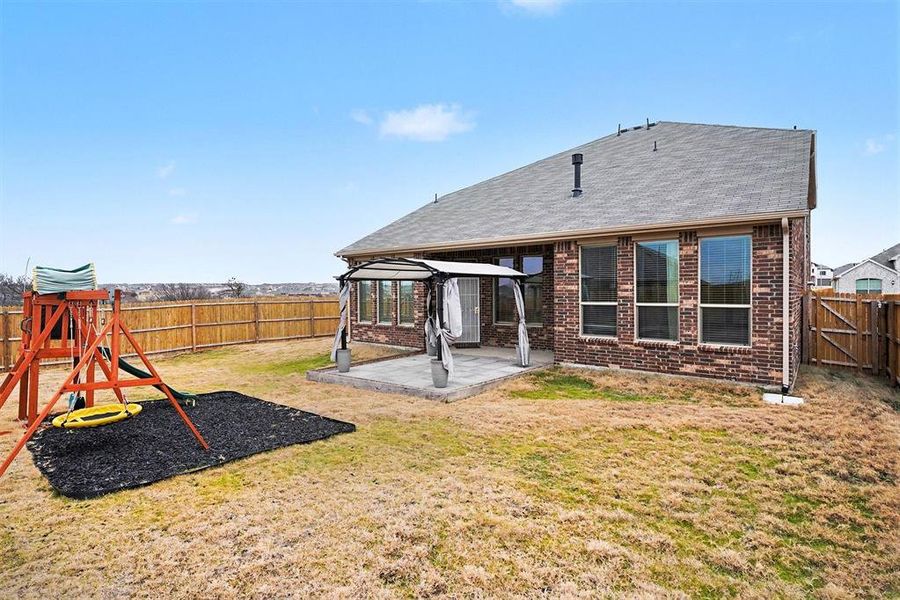 Exterior details and patio area of a home in Northpointe, Fort Worth (Image 3).