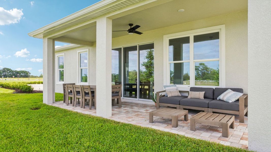 Representative exterior photo of a completed home built from the Sweetgum by DRB Homes in Ardisia Park, New Smyrna Beach, FL (Image 28).