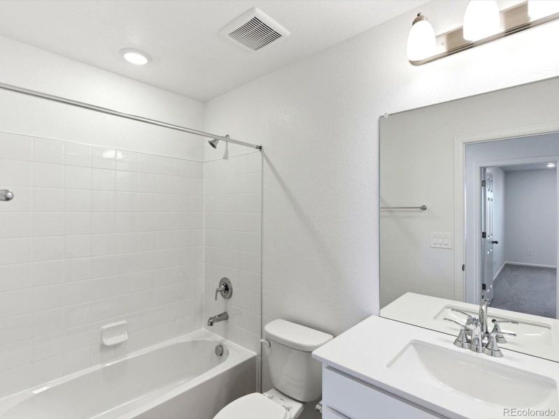 Furnished interior view inside a new home in Buffalo Highlands: The Flora Collection, Commerce City (Image 10).