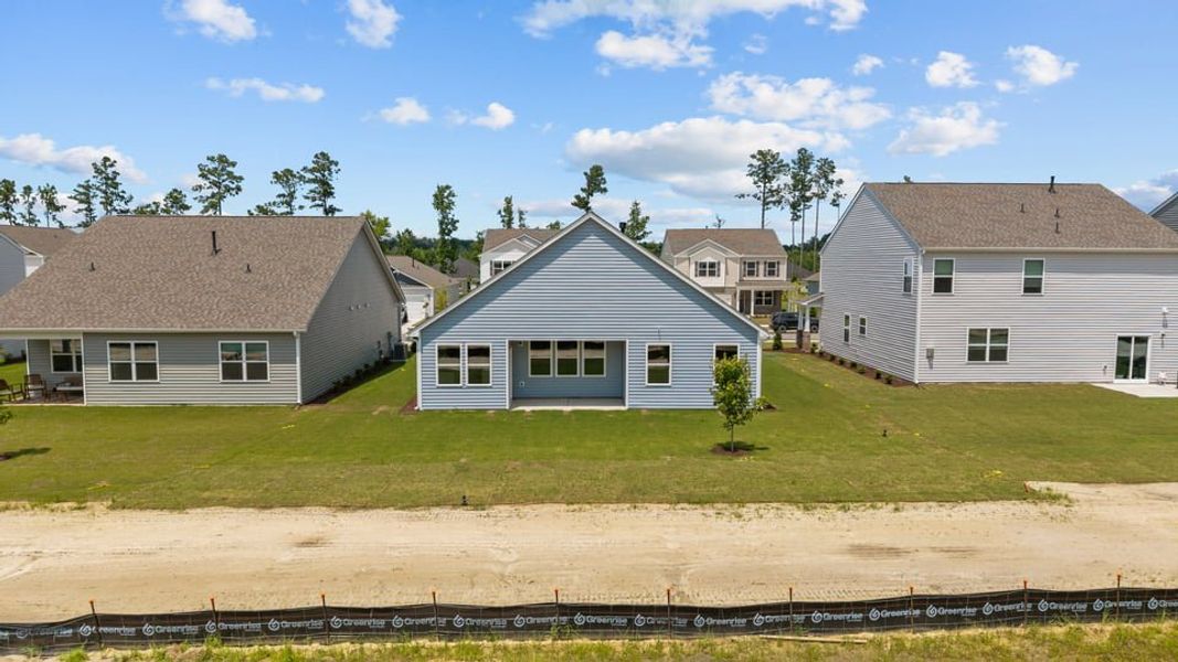 Exterior details and patio area of a home in West New Bern, New Bern (Image 25).
