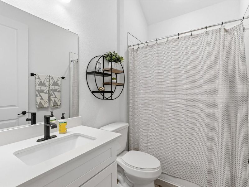 Furnished interior view inside a new home in Ellerden, Tomball (Image 29).