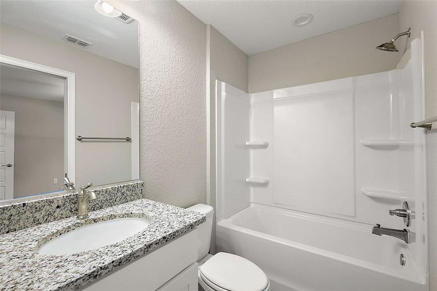 Furnished interior view inside a new home in , Dunnellon (Image 3).