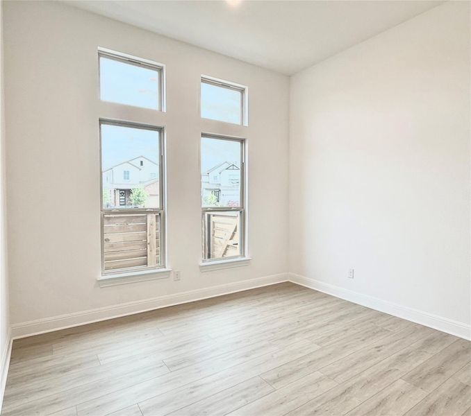 Spacious, unfurnished interior of a new home in Flora, Hutto (Image 22).
