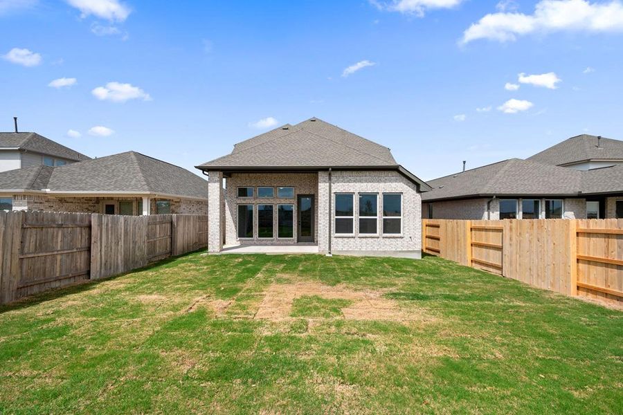 Exterior details and patio area of a home in Flora, Hutto (Image 25).