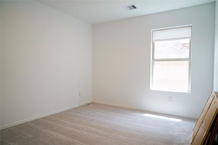 Spacious, unfurnished interior of a new home in Sunterra, Katy (Image 21).
