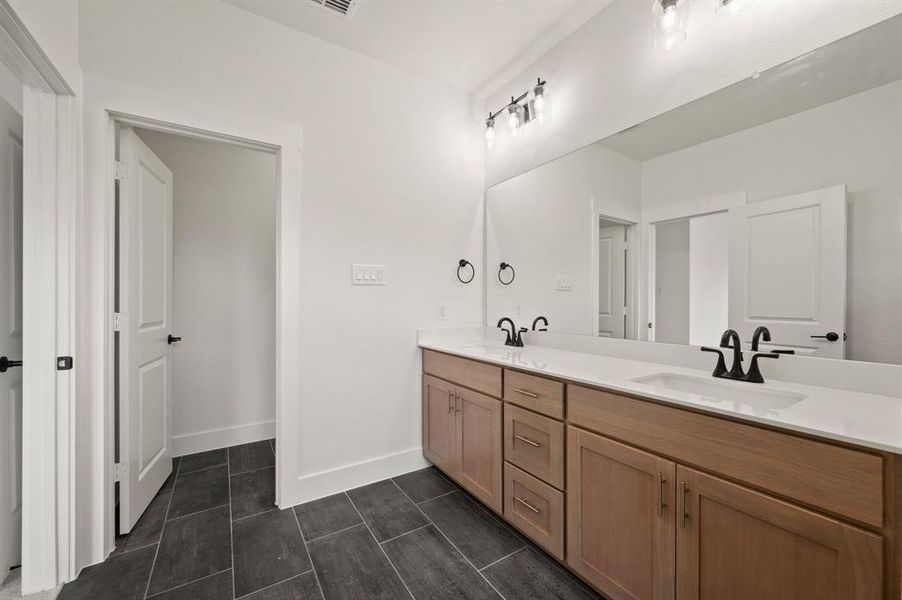 An owner's bath with plenty of room for two!