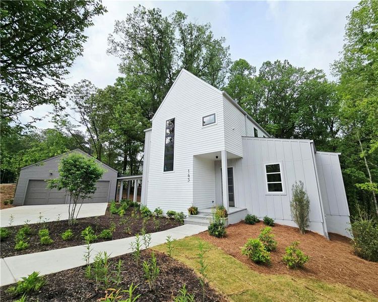 Front exterior of a home in the Aster community, located in Roswell, GA (Image 6).