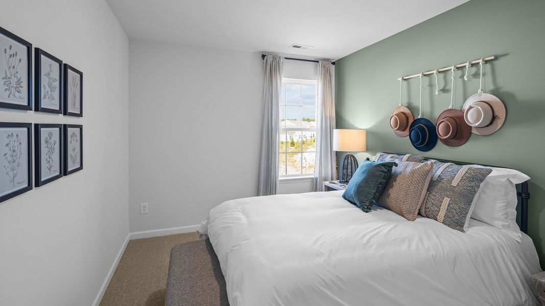 Furnished interior view inside a new home in The Townes at Ridgewood Farms, Winterville (Image 21).