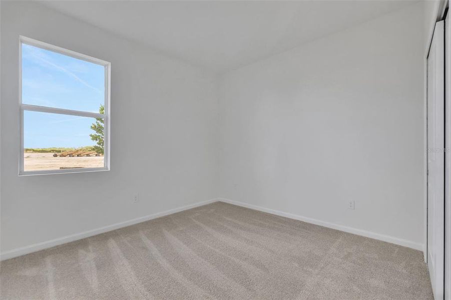 Spacious, unfurnished interior of a new home in Brystol North at Wylder, Port St. Lucie (Image 24).