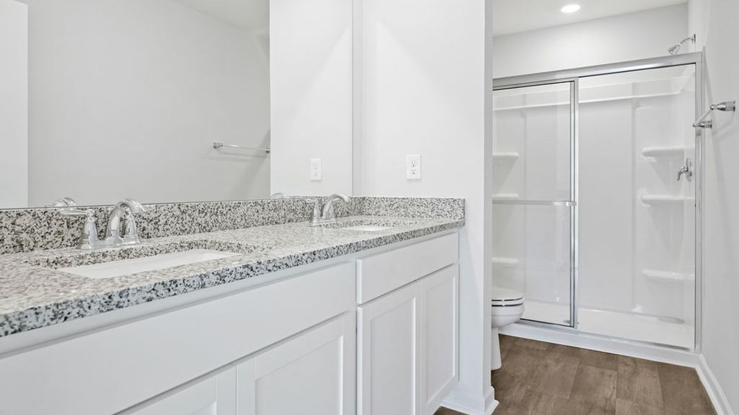 Representative unfurnished interior of a home built from the BAYSHORE by D.R. Horton in Indigo Preserve Townhomes, Leland (Image 24).