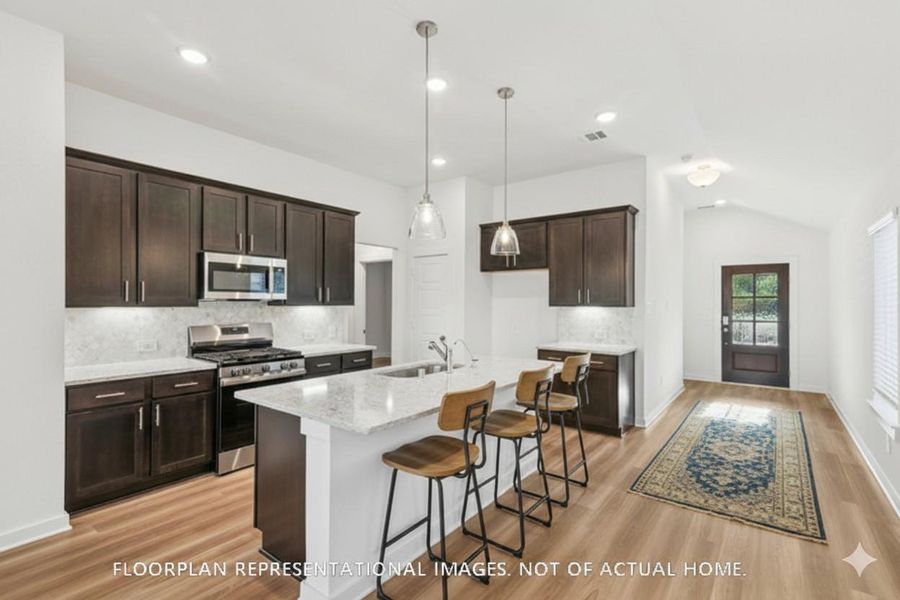 Furnished interior view inside a new home in Lone Star Landing, Montgomery (Image 8).
