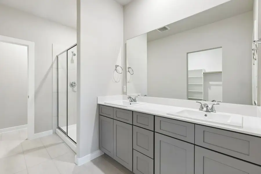 Primary Bathroom in the Haylee home plan by Trophy Signature Homes - REPRESENTATIVE PHOTO