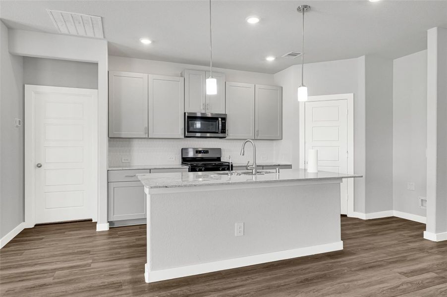 Furnished interior view inside a new home in Sundance Cove - Premier Series, Crosby (Image 5).