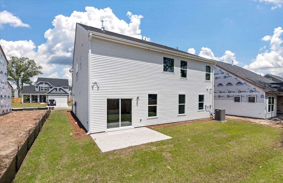 Exterior details and patio area of a home in Oakley Pointe, Moncks Corner (Image 3).
