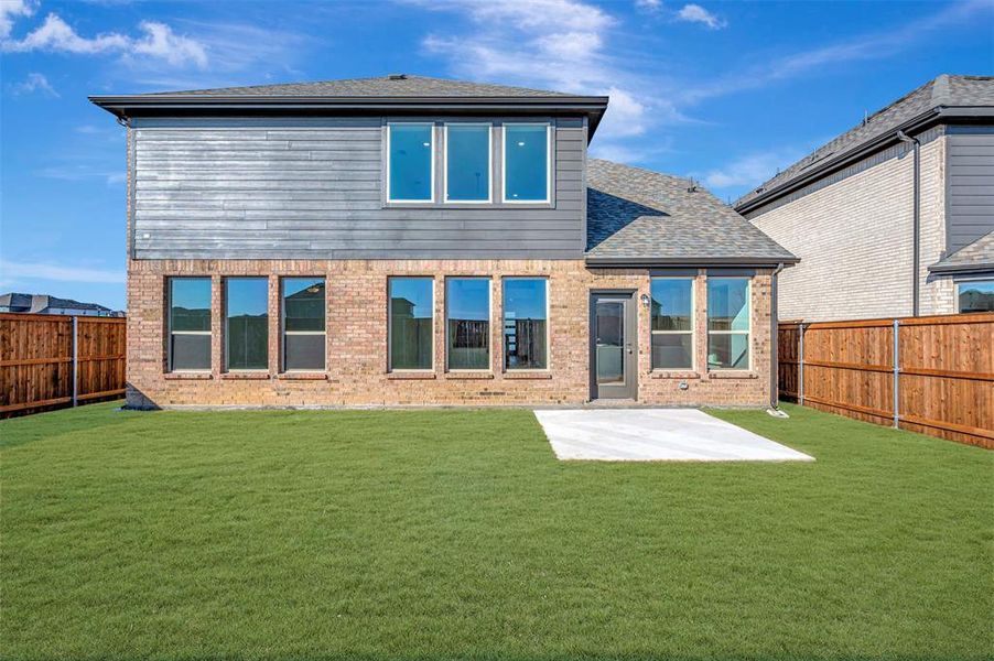 Exterior details and patio area of a home in Lily Creek at Sutton Fields, Aubrey (Image 4). Exterior details and patio area of a home in Lily Creek at Sutton Fields, Aubrey (Image 4).