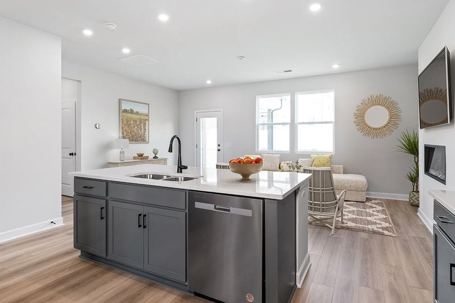 A kitchen with a large island. A kitchen with a large island.