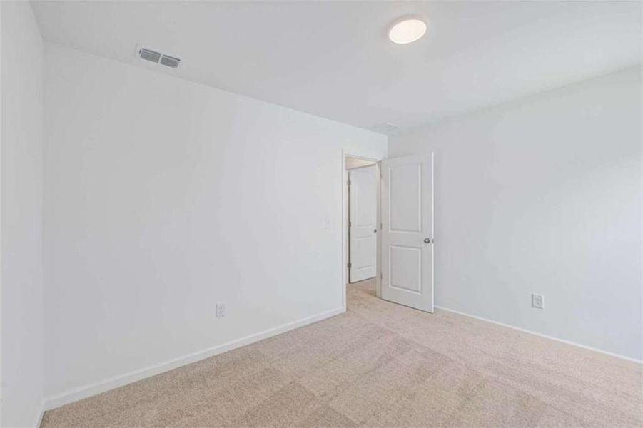 Spacious, unfurnished interior of a new home in The Pointe at Heron Bay, Locust Grove (Image 18).