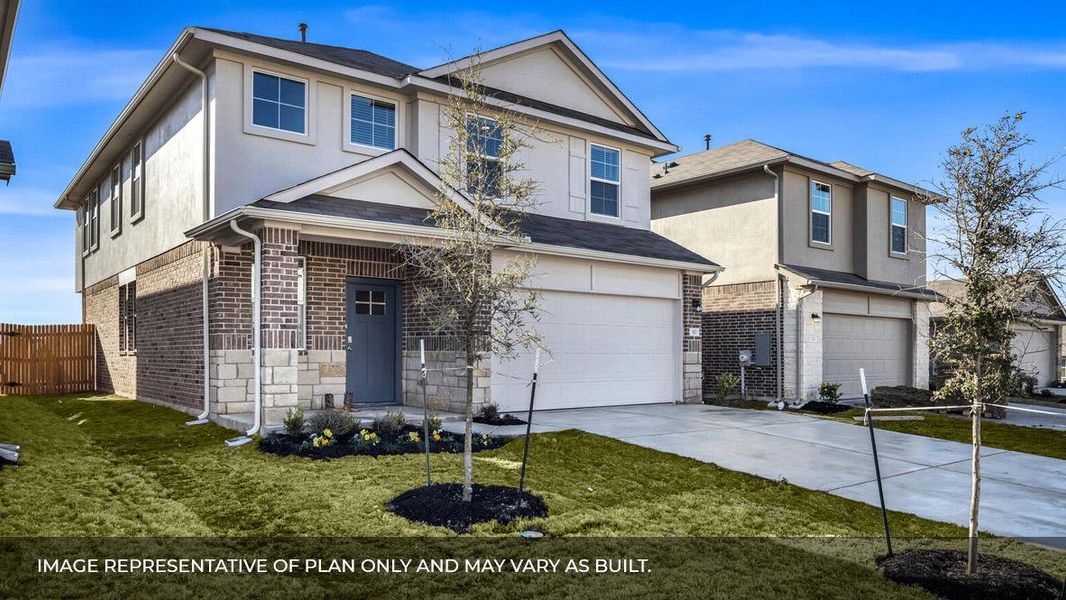Front exterior of a new home in Carillon, Manor, TX, highlighting curb appeal (Image 1). Front exterior of a new home in Carillon, Manor, TX, highlighting curb appeal (Image 1).