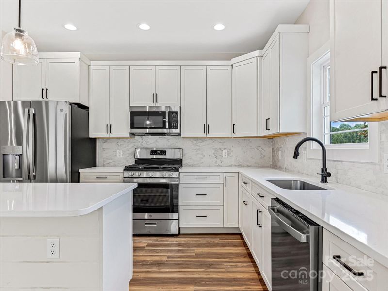Quartz Counters - Custom Cabinetry