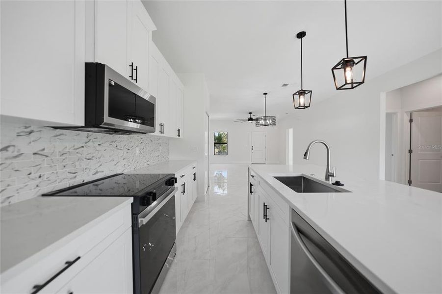 Furnished interior view inside a new home in , Port Charlotte (Image 8).