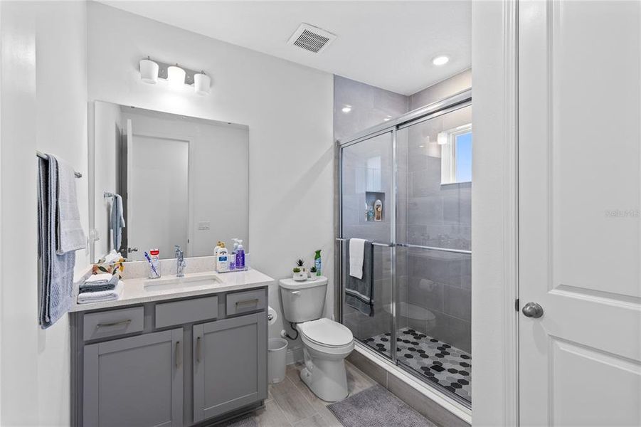 Furnished interior view inside a new home in Laureate Park, Orlando (Image 34).