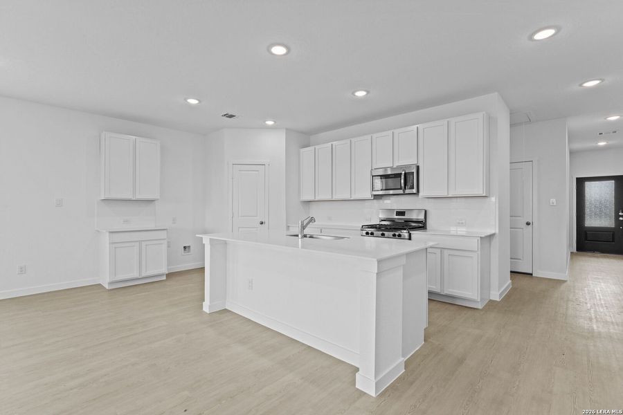 Furnished interior view inside a new home in Waterwheel, San Antonio (Image 6).