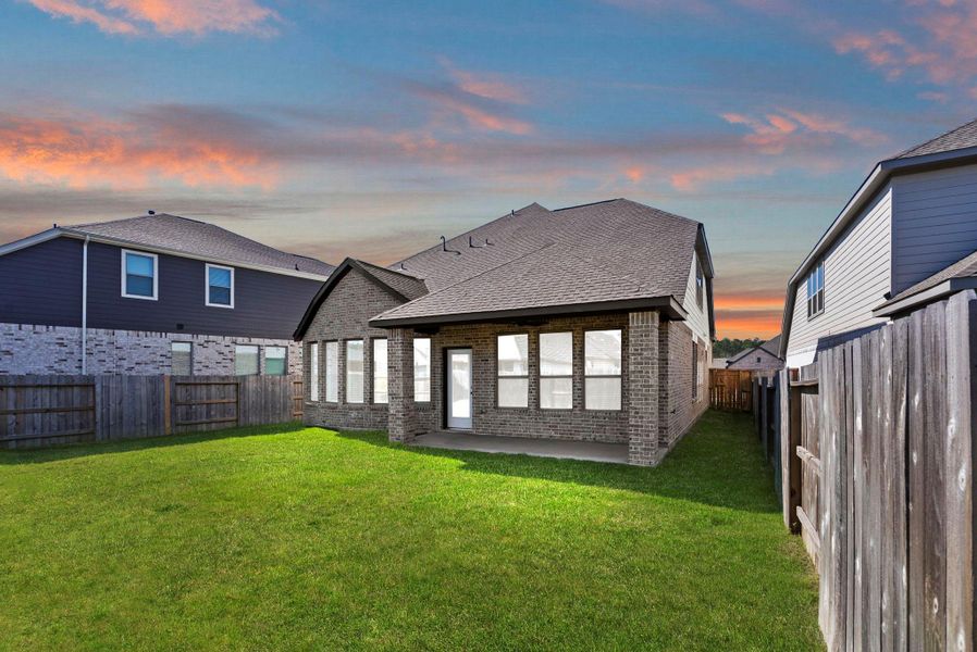 Exterior details and patio area of a home in The Trails 50', New Caney (Image 3).