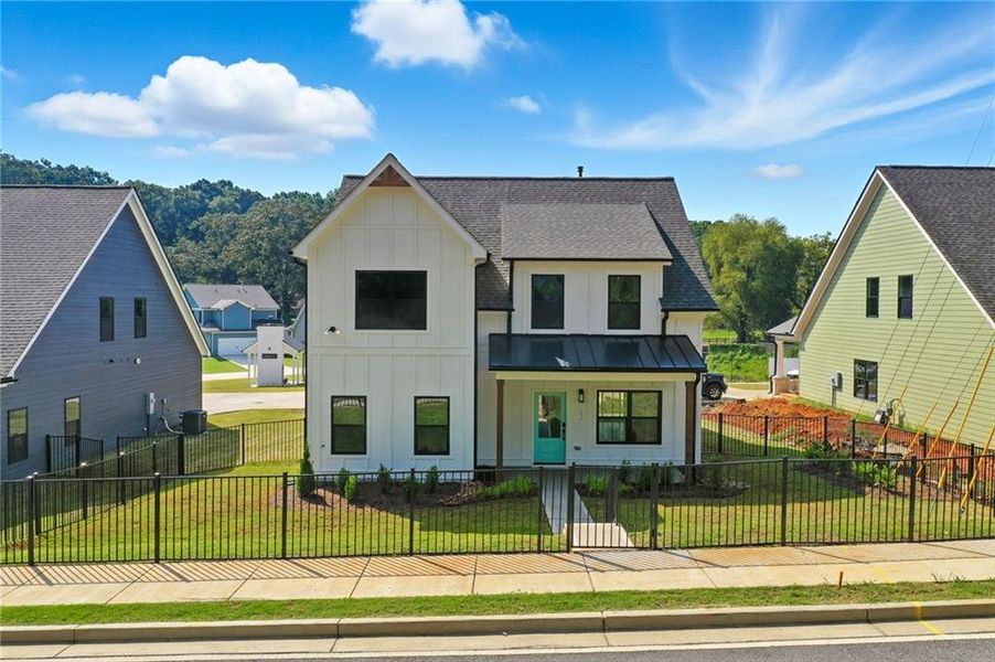 Front exterior of a new home in , Emerson, GA, highlighting curb appeal (Image 18).