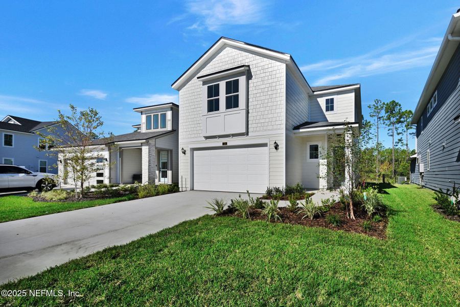 Exterior details and patio area of a home in Crosswinds at Nocatee, Ponte Vedra (Image 25).