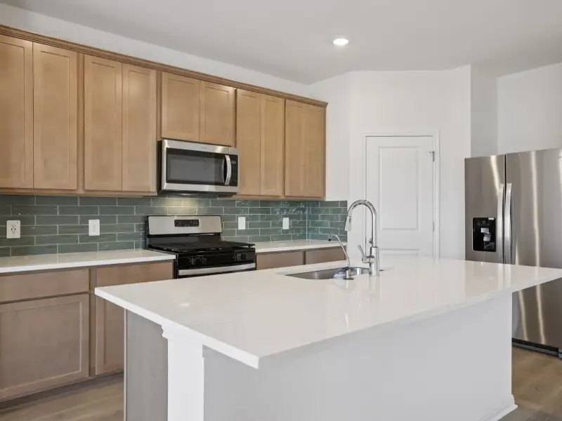 Furnished interior view inside a new home in Prairie Winds - Reserve Collection, Hutto (Image 3). Furnished interior view inside a new home in Prairie Winds - Reserve Collection, Hutto (Image 3).