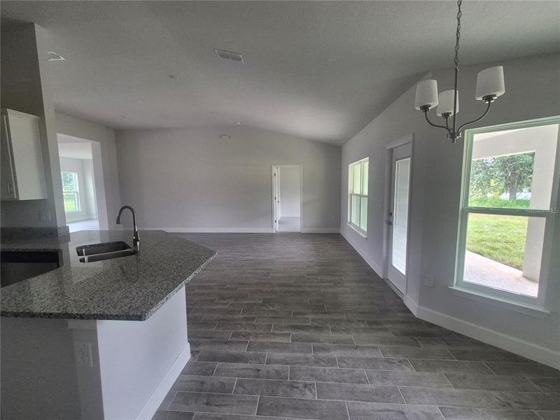 Furnished interior view inside a new home in Hill Country Estates, Dade City (Image 7).