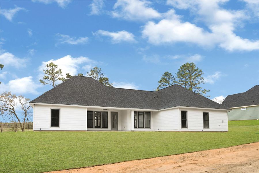 Exterior details and patio area of a home in , Plantersville (Image 23).