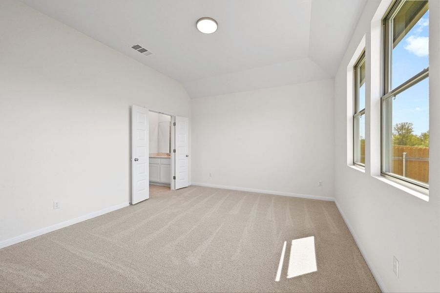 Primary Suite in the Cedar home plan by Trophy Signature Homes – REPRESENTATIVE PHOTO