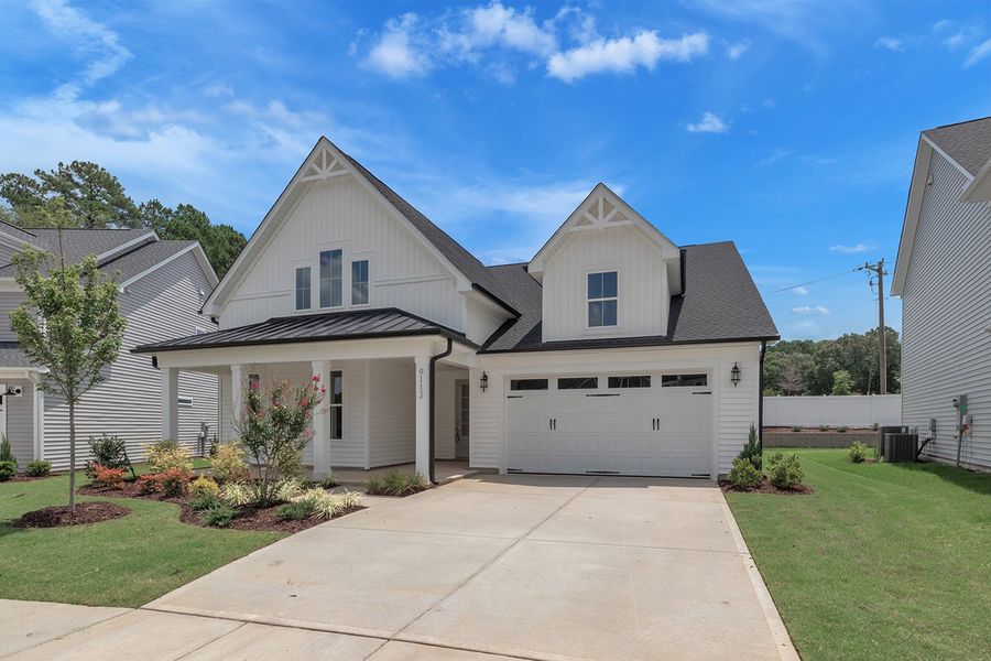 Representative exterior photo of a completed home built from the The Sutton by RobuckHomes in Kennebec Crossing, Angier, NC (Image 17).