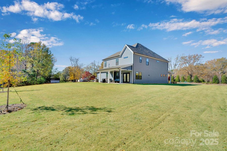 Exterior details and patio area of a home in Whitaker Pointe, Huntersville (Image 3).