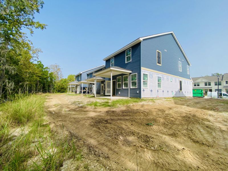 Front exterior of a new home in Tributary At The Park At Rivers Edge, North Charleston, SC, highlighting curb appeal (Image 23).