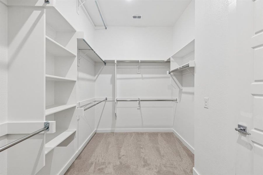 Primary Closet in the Picasso II home plan by Trophy Signature Homes – REPRESENTATIVE PHOTO