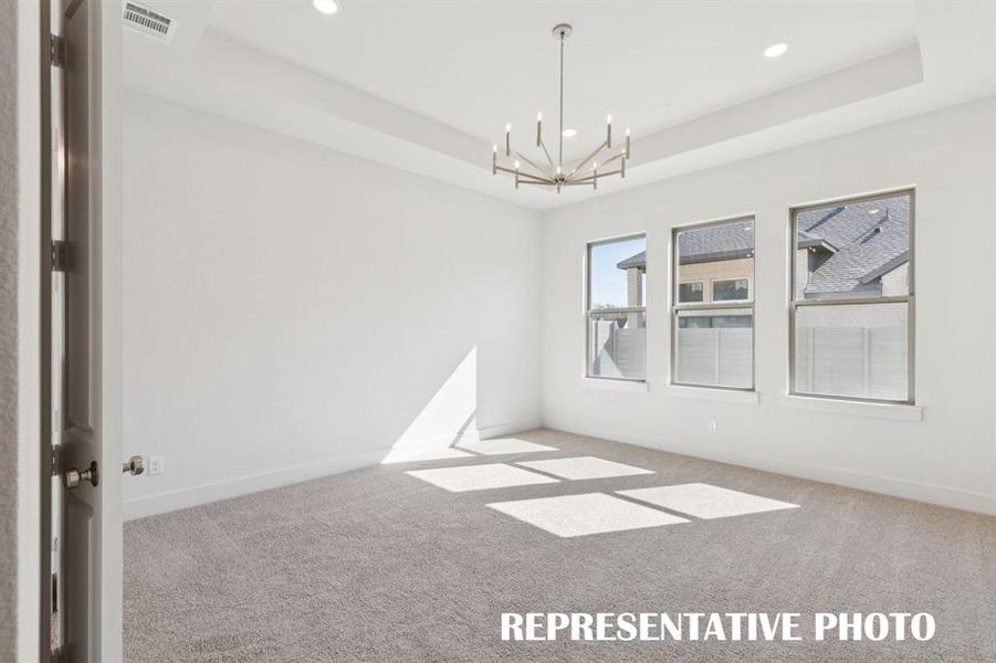 This dreamy owner's suite is located at the rear of the home for additional privacy.  REPRESENTATIVE PHOTO