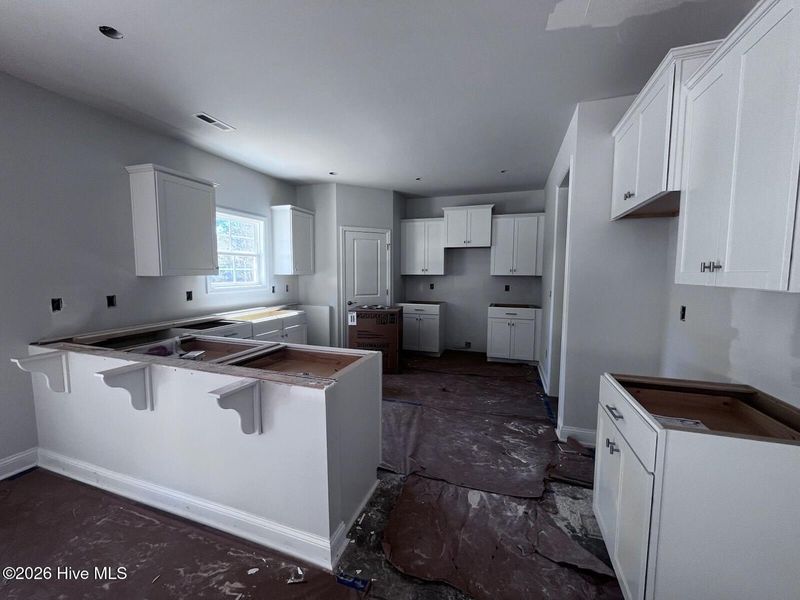 In-progress construction of a new home in Rutledge, Shallotte, NC (Image 23).