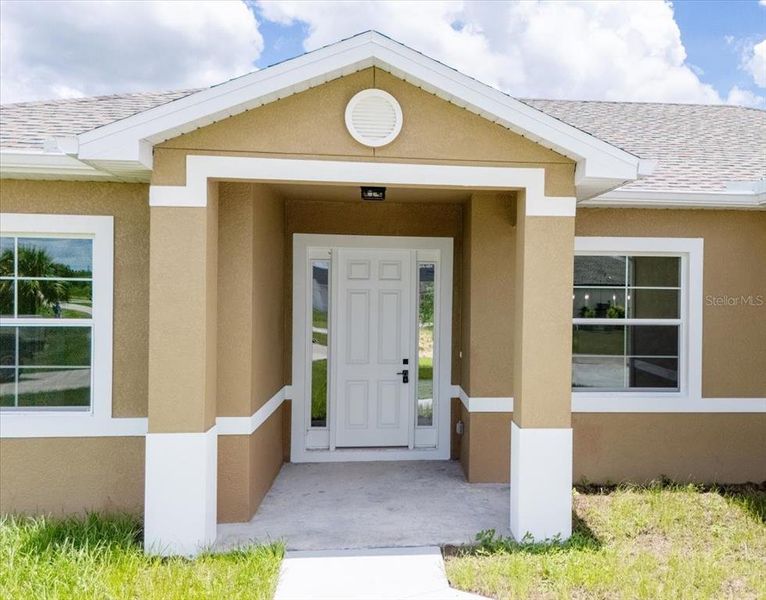 Exterior details and patio area of a home in , Lehigh Acres (Image 31).