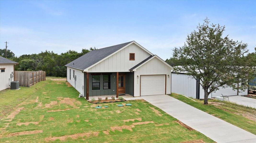 Front exterior of a new home in , Granbury, TX, highlighting curb appeal (Image 18). Front exterior of a new home in , Granbury, TX, highlighting curb appeal (Image 18).
