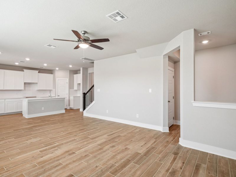 Living room in the Red River floorplan at a Meritage Homes community.